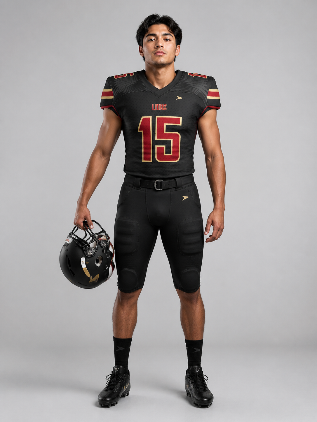 Latino athlete wearing a complete Dynamic Blitz football uniform from shoulder pads to cleats